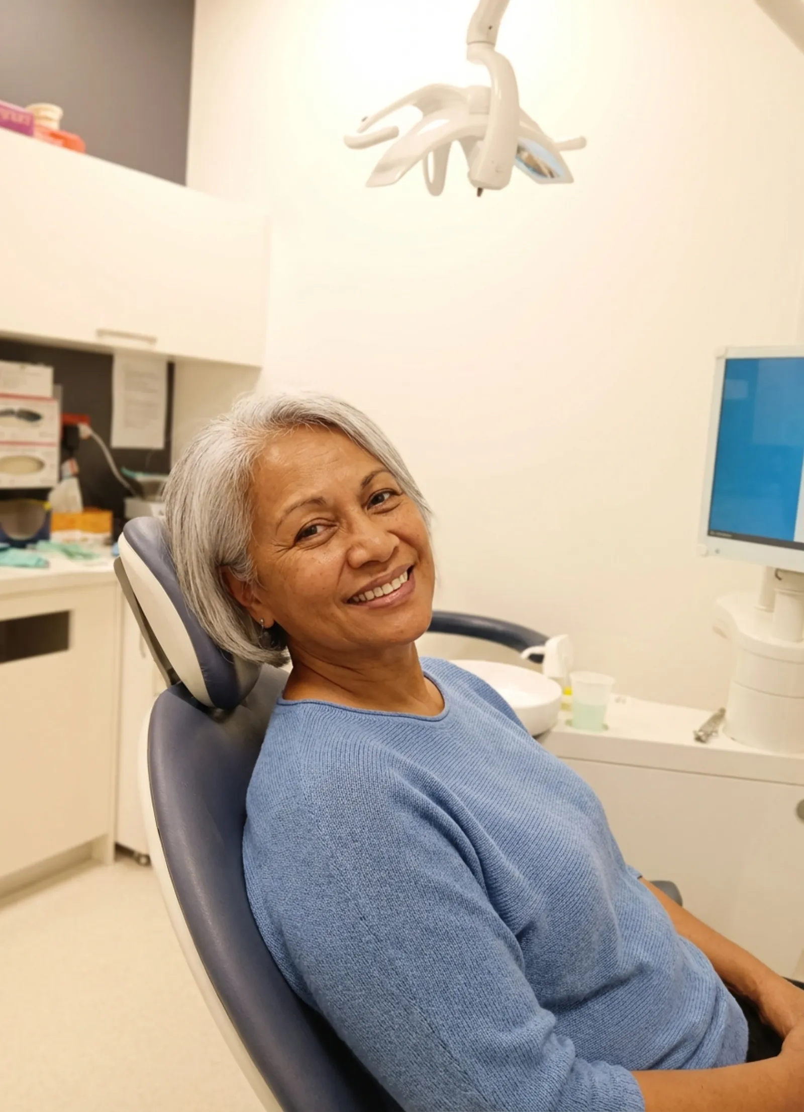 Patient smiling during cosmetic dentistry consultation at Compass Dental Care Darwin